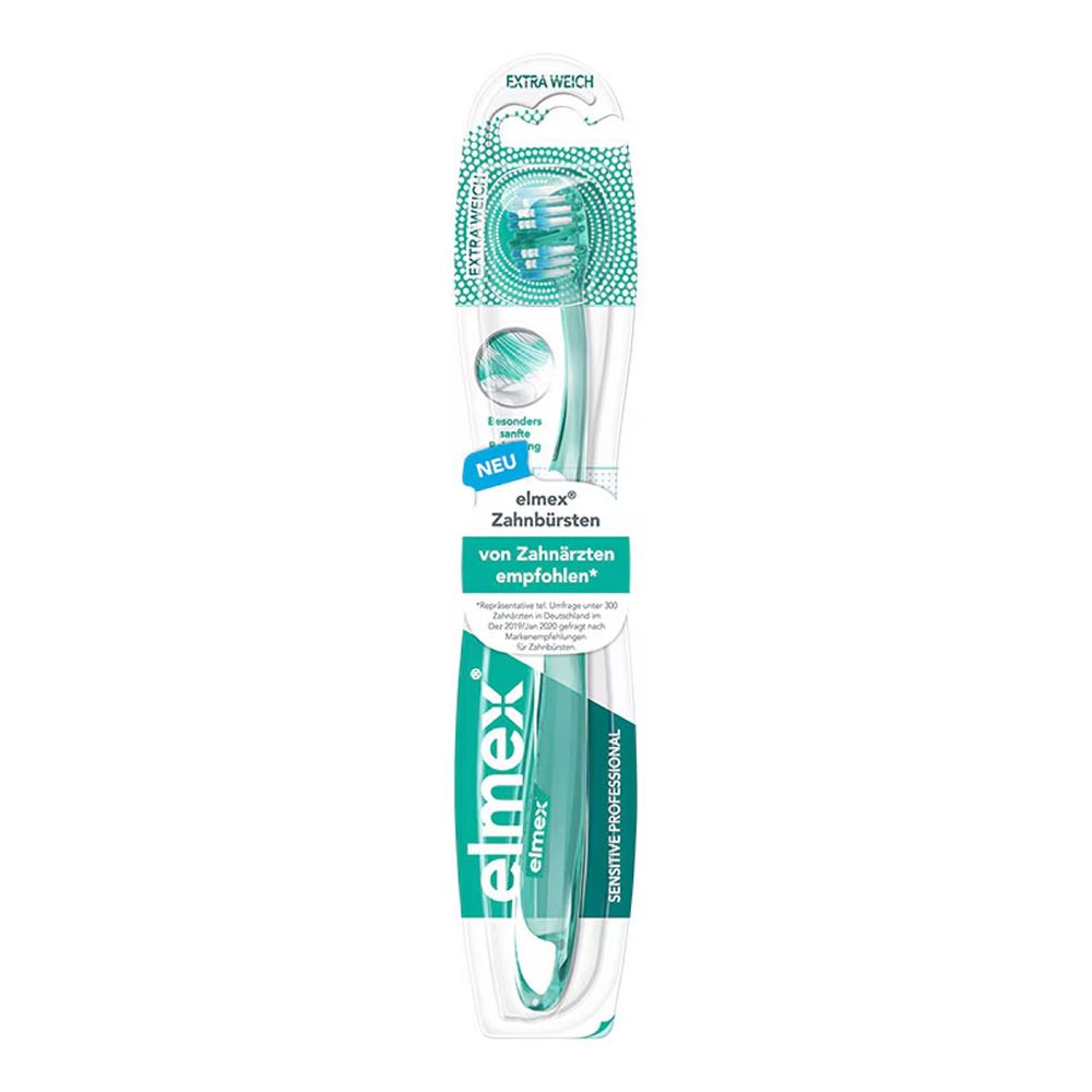 Brosse à dents dans son emballage. Manche vert transparent, tête blanche. Texte: elmex Sensitive Professional, extra souple.