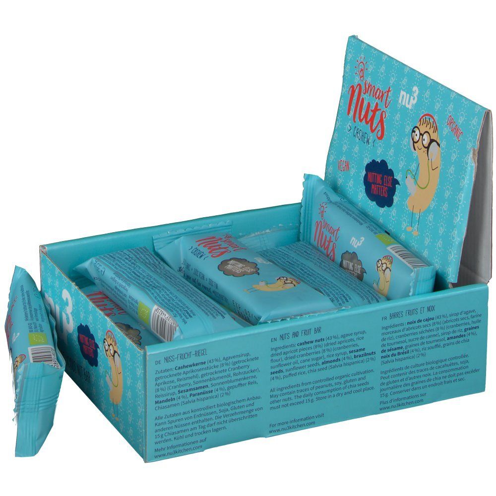 Boîte bleu clair ouverte avec des barres. Inscription : smart Nuts. Texte sur l'emballage. Liste des ingrédients.