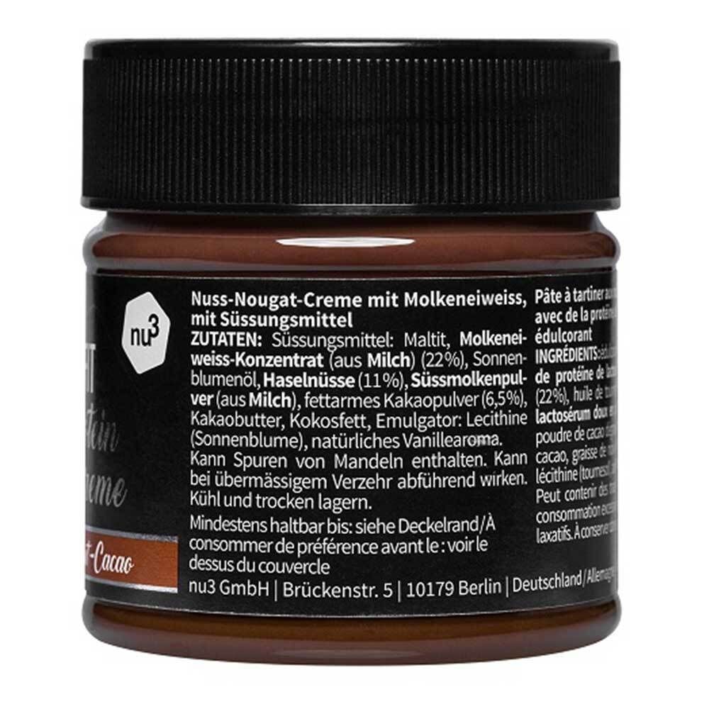 Dos du pot de crème protéinée Fit. Liste des ingrédients et informations du fabricant sur l'étiquette.