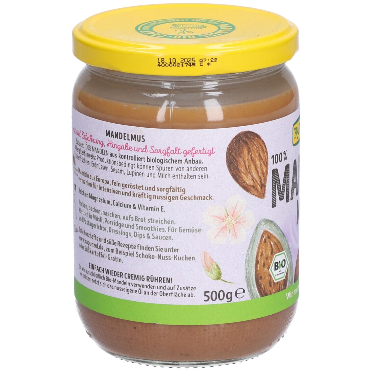 Pot de beurre d'amandes. Couvercle jaune, étiquette avec texte et ingrédients. 'Mandelmus' et 'Bio'.