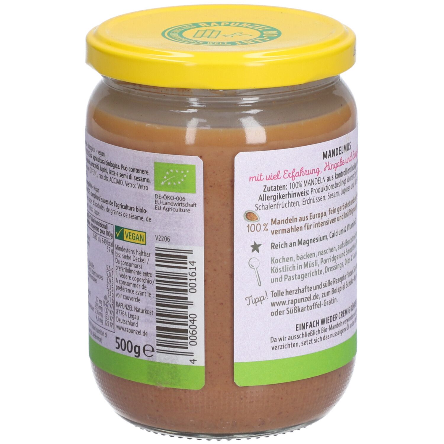 Pot de beurre d'amandes. Couvercle jaune, étiquette avec texte et ingrédients. 'Mandelmus' et 'Bio'.