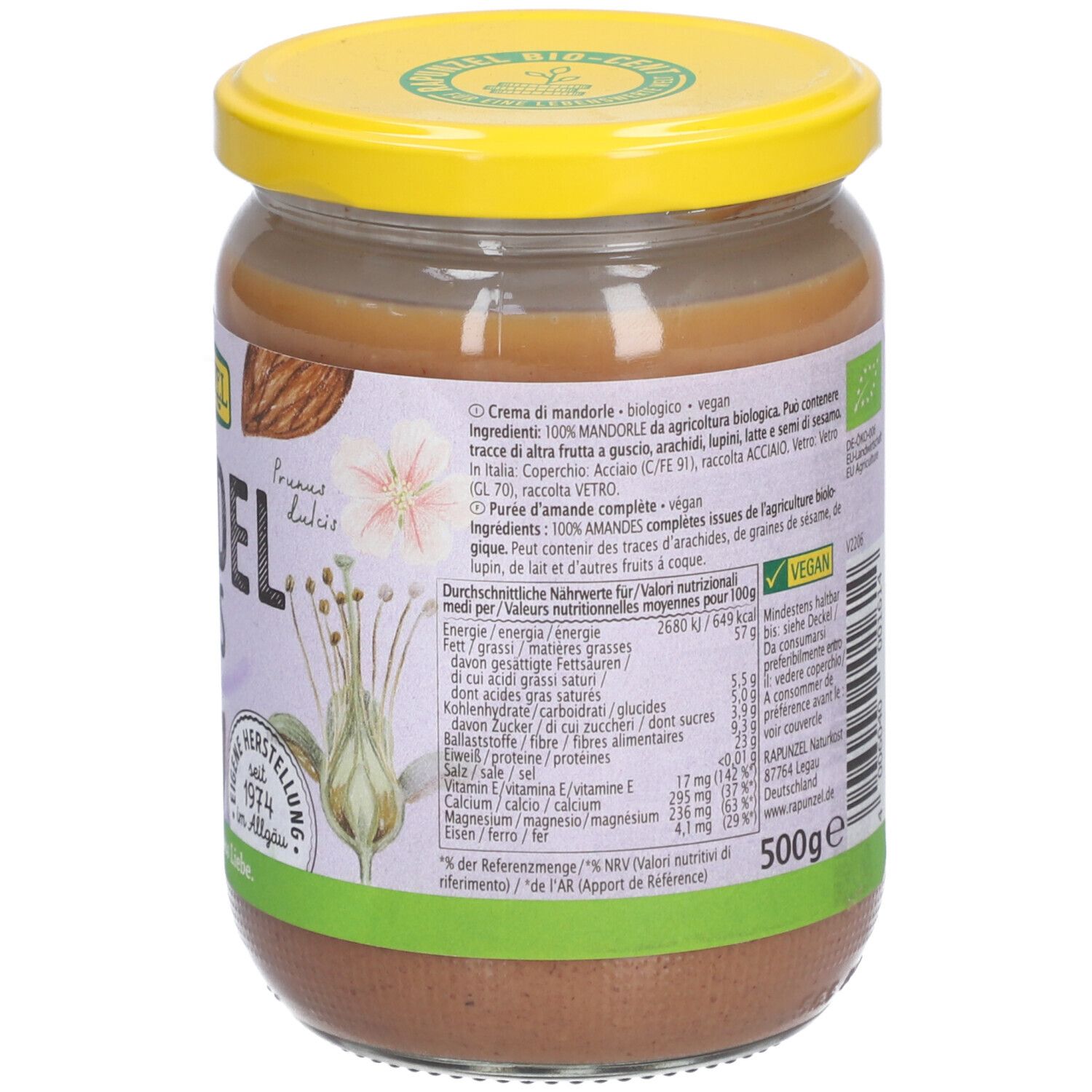 Pot de beurre d'amandes. Couvercle jaune, étiquette avec texte et ingrédients. 'Mandelmus' et 'Bio'.