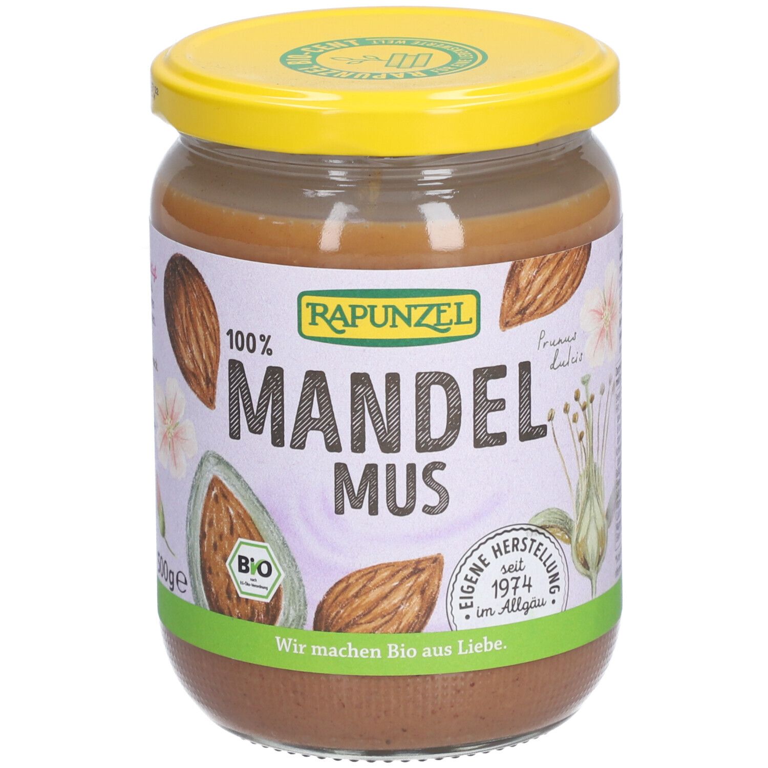 Pot de beurre d'amandes. Couvercle jaune, étiquette avec 'Mandelmus' et 'Bio'.