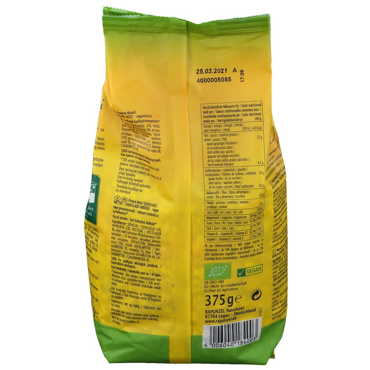 Dos du paquet de Rapunzel Protein Müsli. Contient des informations nutritionnelles, une liste d'ingrédients et un label bio. 375g. Label vegan.