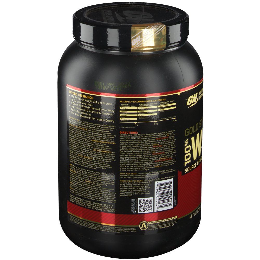Pot noir avec étiquette rouge. Inscription : Gold Standard 100% Whey, Optimum Nutrition. Dos avec informations produit et code QR.