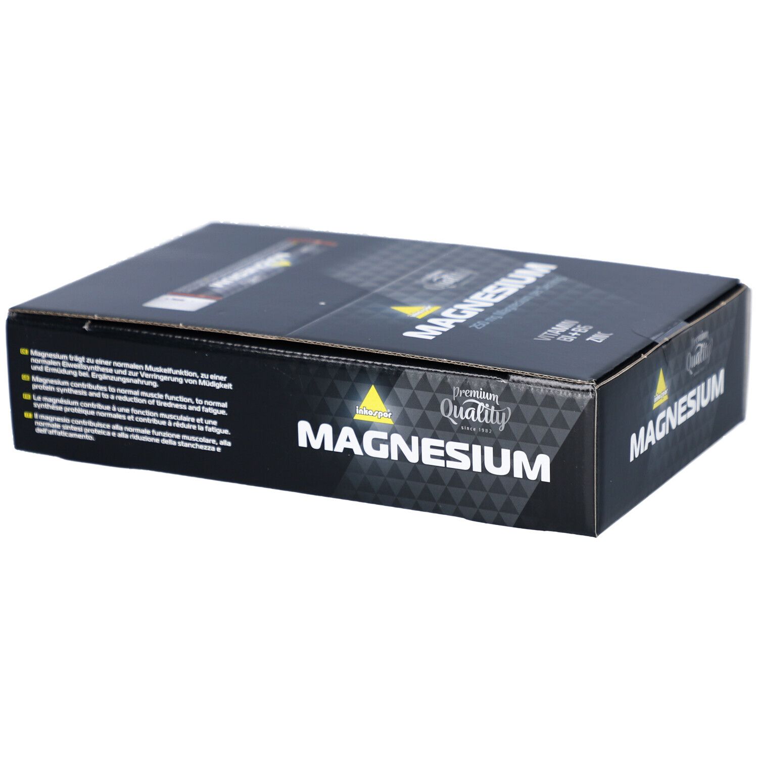 Boîte noire avec "MAGNESIUM" et logo "Premium Quality". Texte multilingue.