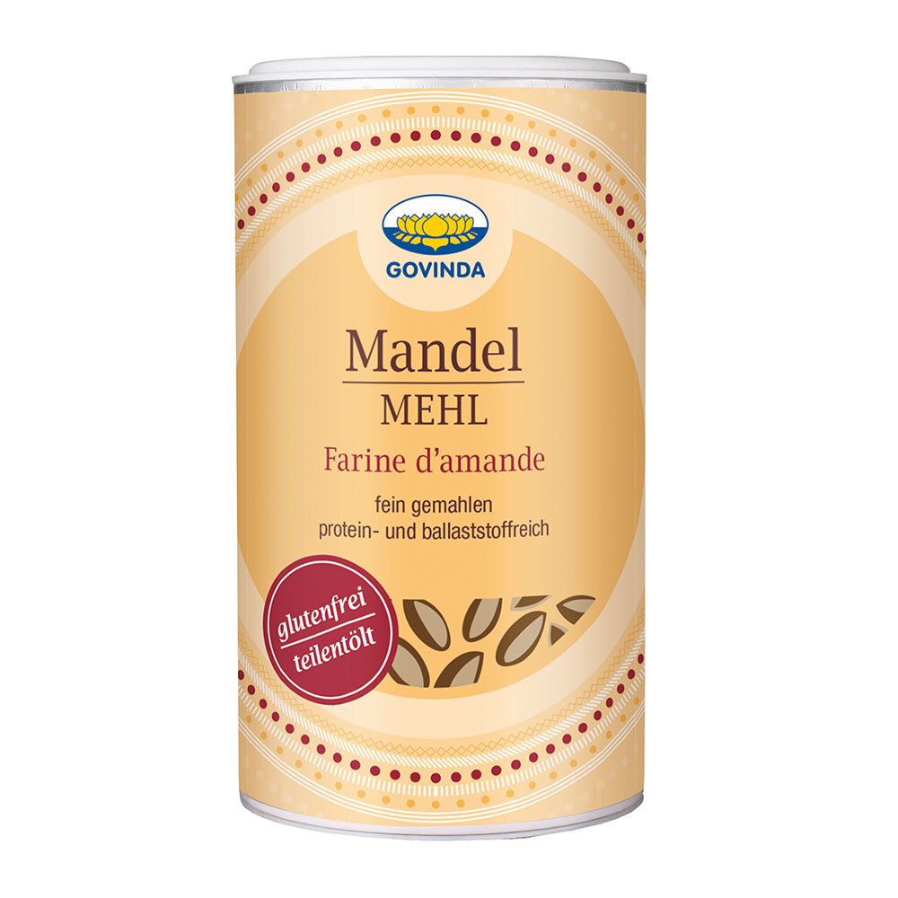 Boîte cylindrique avec inscription "Govinda Mandel MEHL". Inscriptions : Farine d'amande, sans gluten, riche en protéines et fibres.