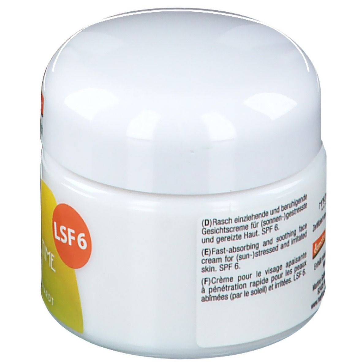 Pot de crème blanc avec couvercle. Étiquette avec texte: LSF 6, description en allemand, anglais et français.