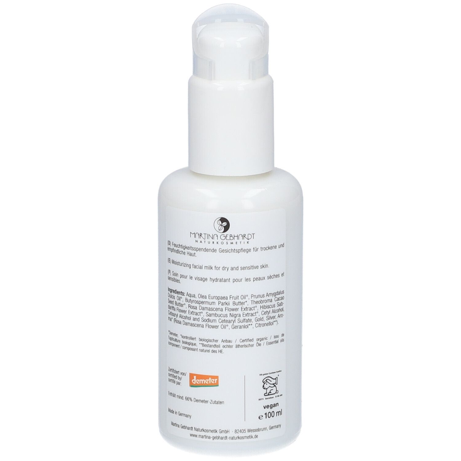 Flacon blanc avec pompe. Inscriptions et texte. Label Vegan. Label Demeter. Texte en allemand et anglais.