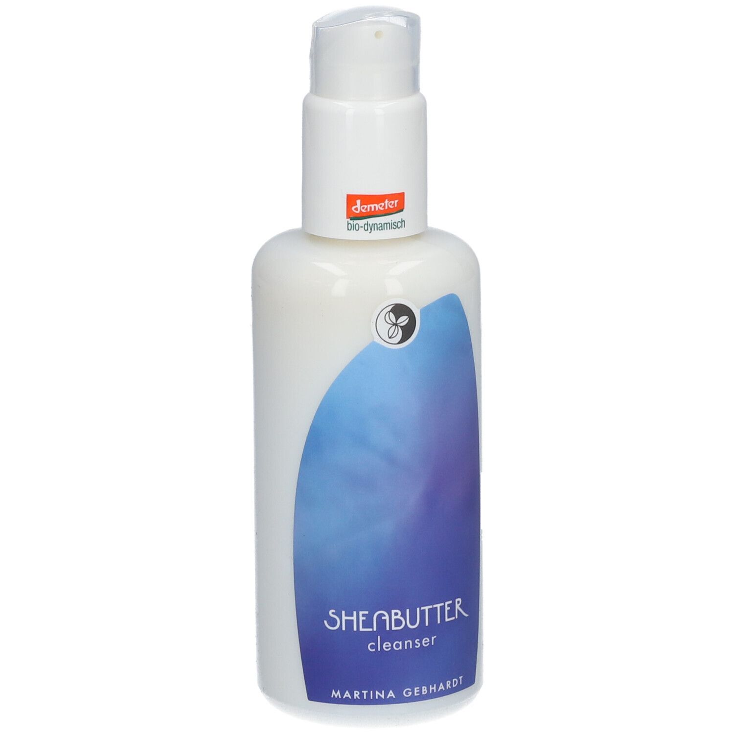 Flacon blanc avec pompe. Inscription SHEABUTTER cleanser et Martina Gebhardt. Label Demeter.