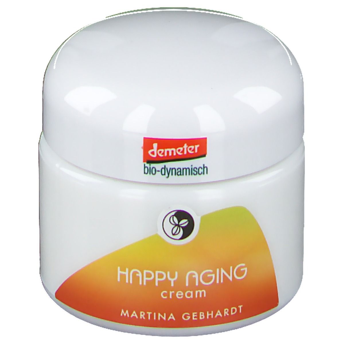 Crème visage Martina Gebhardt Happy Aging dans un pot blanc avec étiquette orange-jaune.