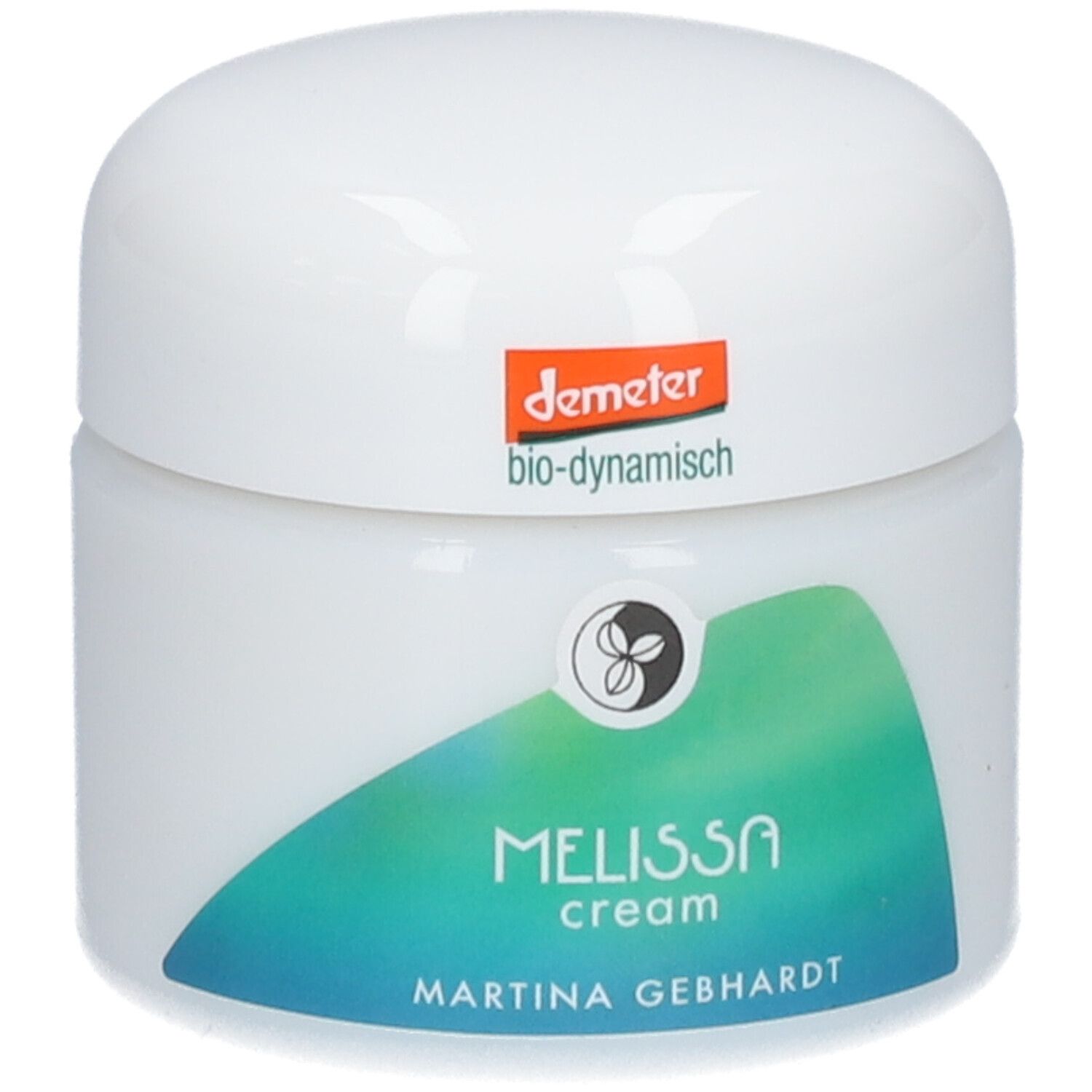 Crème à la mélisse Martina Gebhardt dans un pot blanc avec sceau Demeter et graphique ondulé vert.