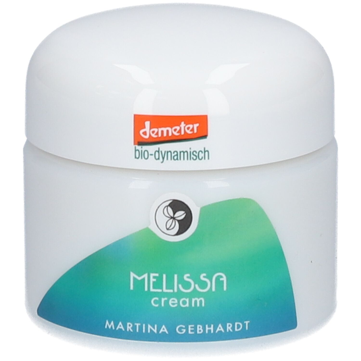 Crème à la mélisse Martina Gebhardt dans un pot blanc avec sceau Demeter et graphique ondulé vert.