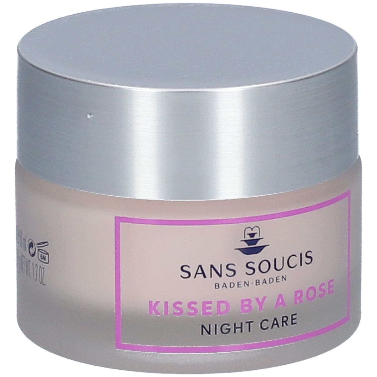 Pot de crème avec couvercle argenté. Inscription : SANS SOUCIS, KISSED BY A ROSE, Night Care. Étiquette rose avec cadre violet.