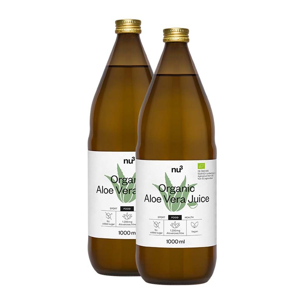 Deux bouteilles de jus d'aloe vera bio nu3. Bouteilles en verre brun avec étiquette. Inscription : Organic Aloe Vera Juice.