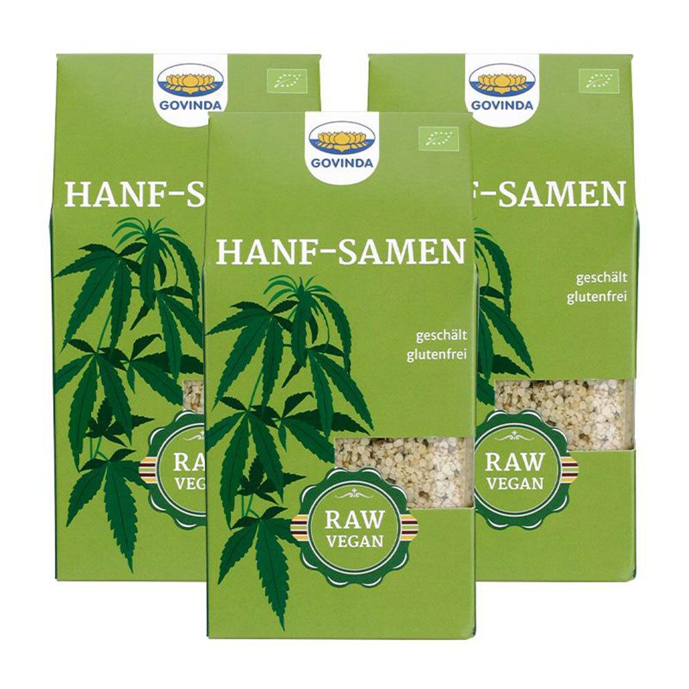 Trois paquets verts de graines de chanvre. Inscription : HANF-SAMEN, RAW VEGAN, sans gluten. Marque GOVINDA. Label bio.