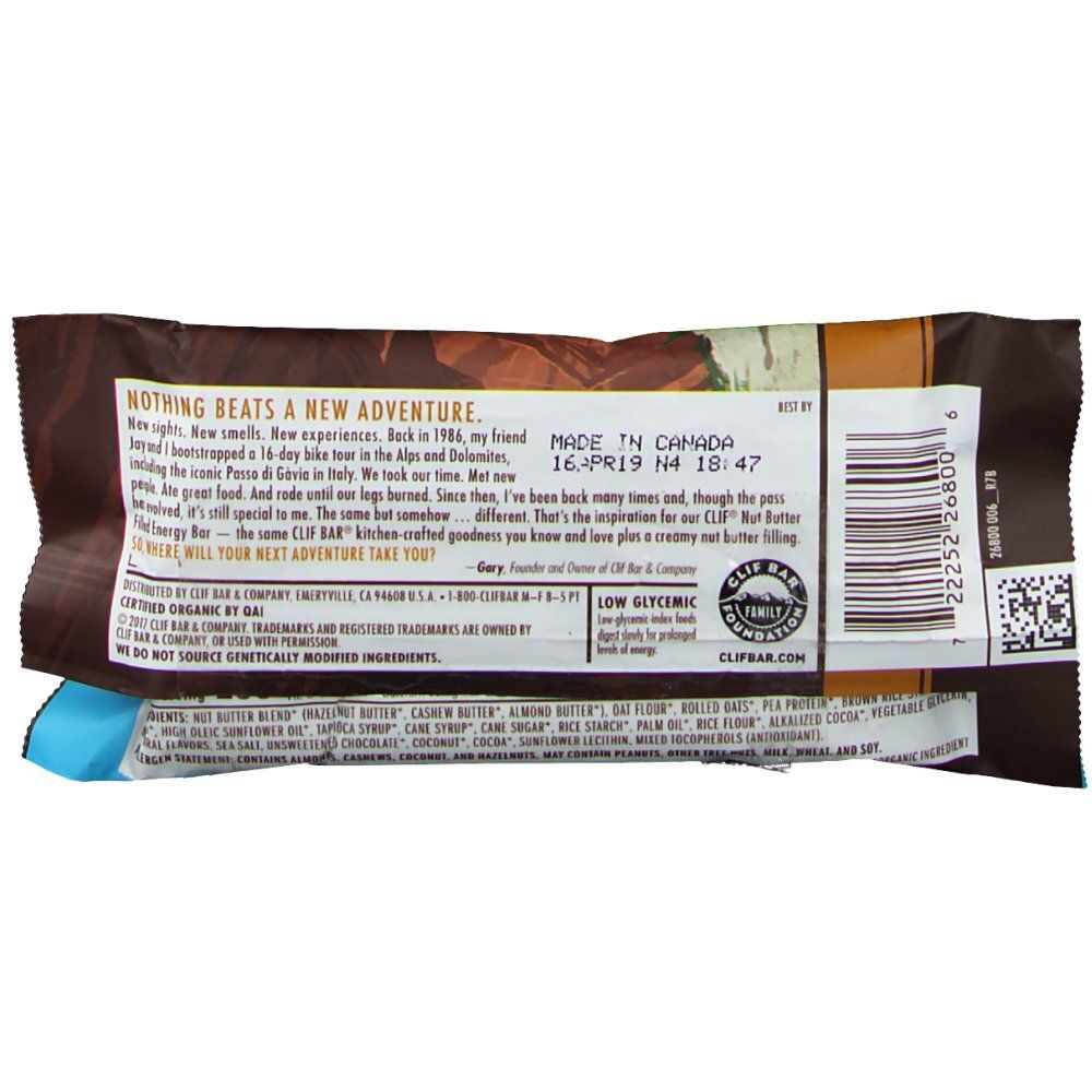 Dos de l'emballage CLIF Bar Bio Nut Butter Filled Chocolate-Hazelnut. Texte : ingrédients, informations nutritionnelles, "Made in Canada", date limite.