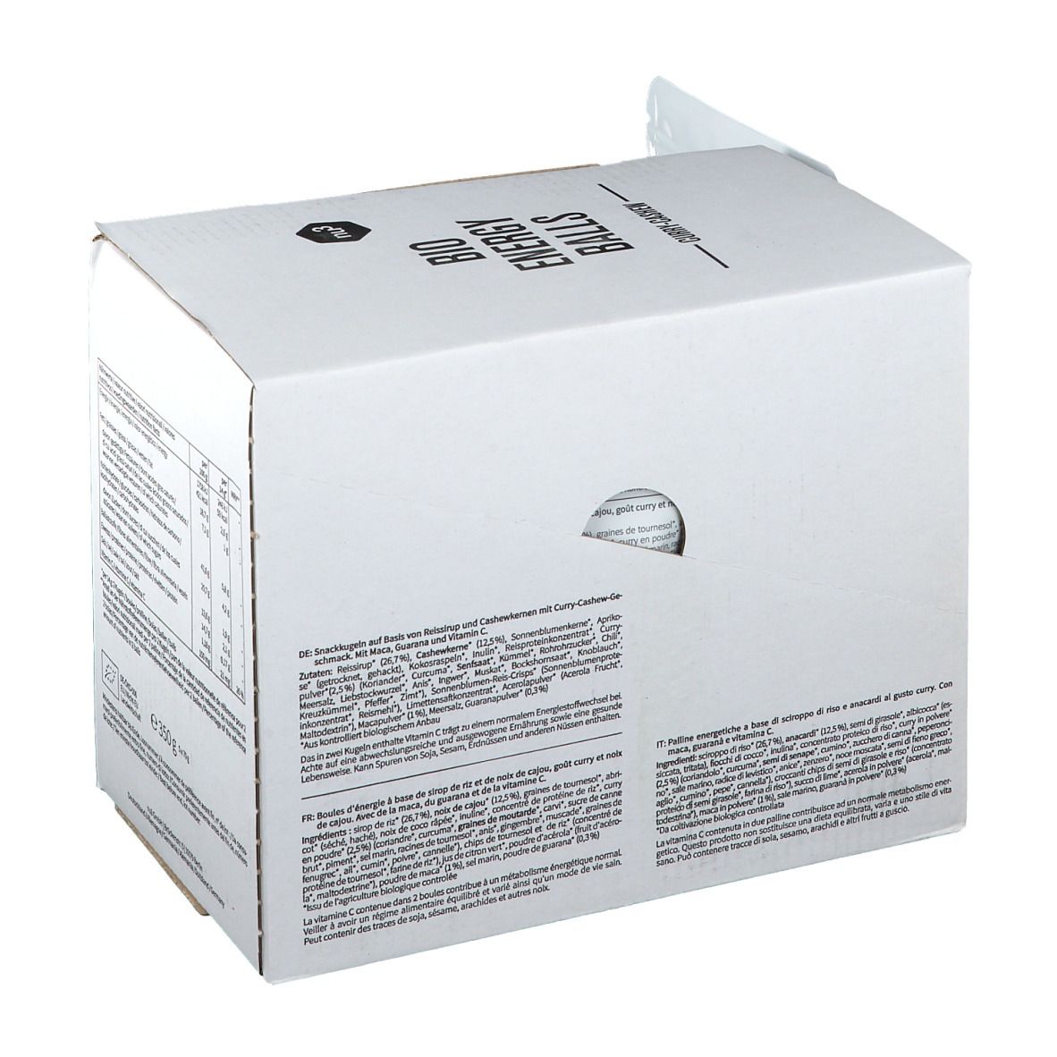 Dos d'un emballage en carton blanc avec texte. Contient des informations nutritionnelles et des listes d'ingrédients. Trou pour la poignée.