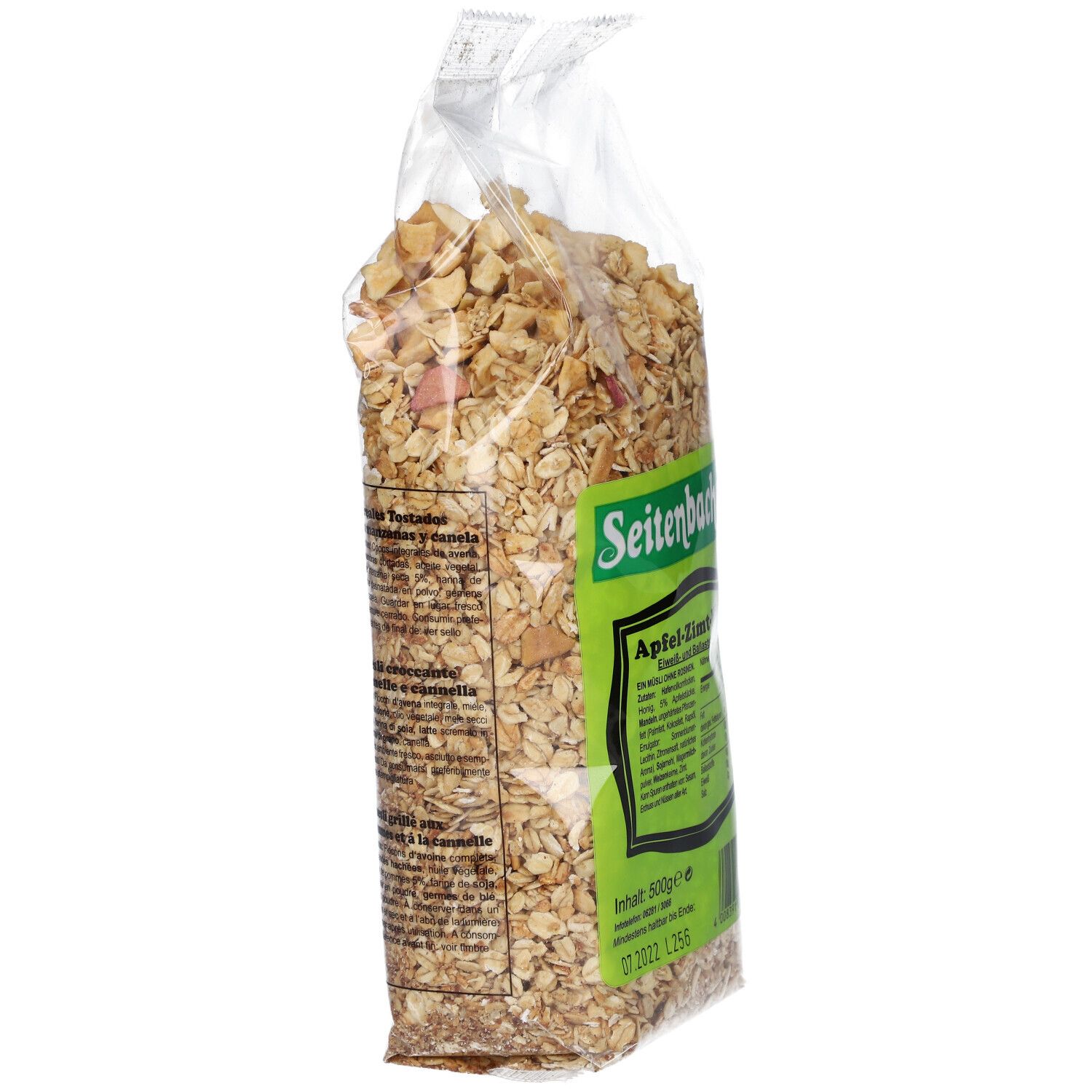 Muesli Pomme-Cannelle Seitenbacher dans un sachet transparent. Étiquette verte avec informations. Vue latérale.