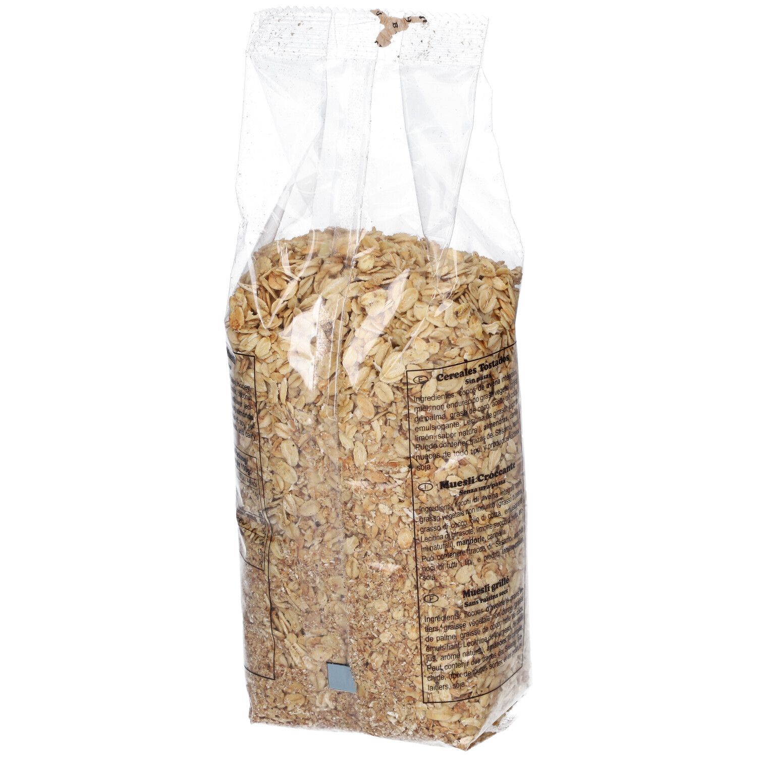 Dos d'un sachet transparent de Muesli Gebackenes Seitenbacher. Texte sur étiquette jaune.