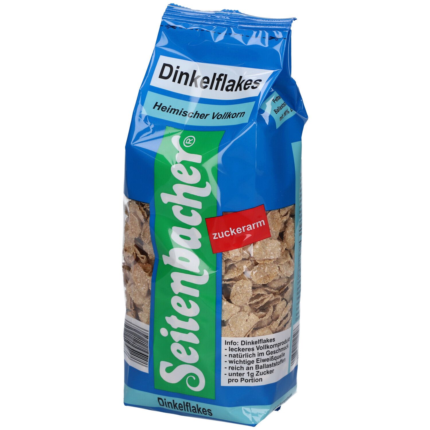 Paquet de Dinkelflakes. Sac bleu avec nom et logo du produit. Flocons visibles à travers le film transparent.