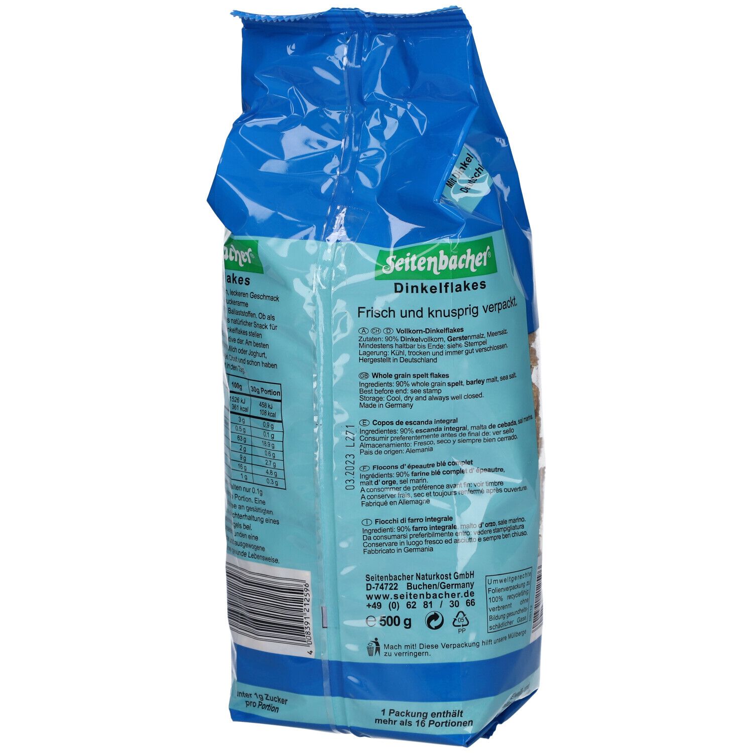 Dos du paquet de Dinkelflakes. Sac bleu avec informations sur le produit, liste des ingrédients et informations nutritionnelles.