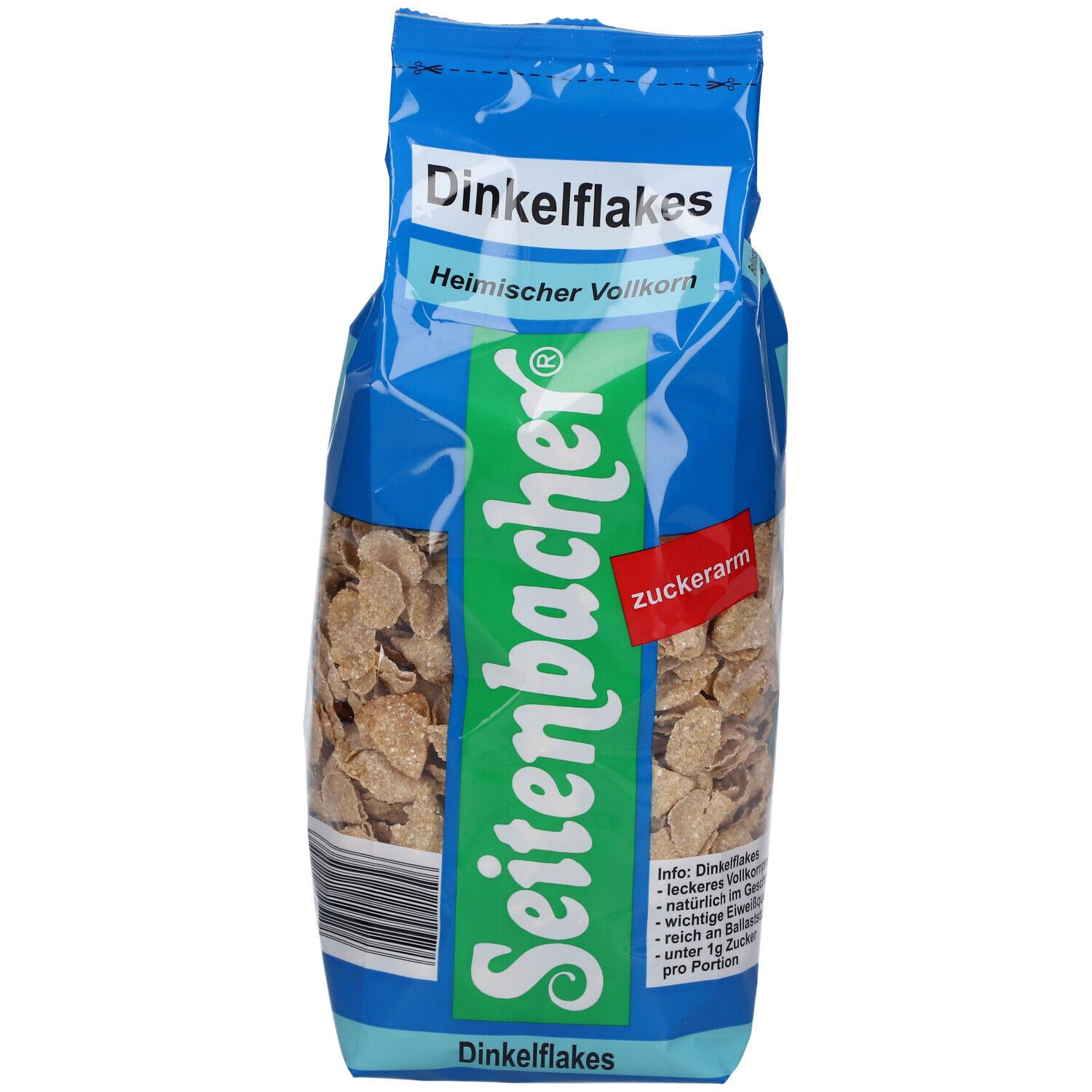 Paquet de Dinkelflakes. Sac bleu avec nom et logo du produit. Flocons visibles à travers le film transparent.