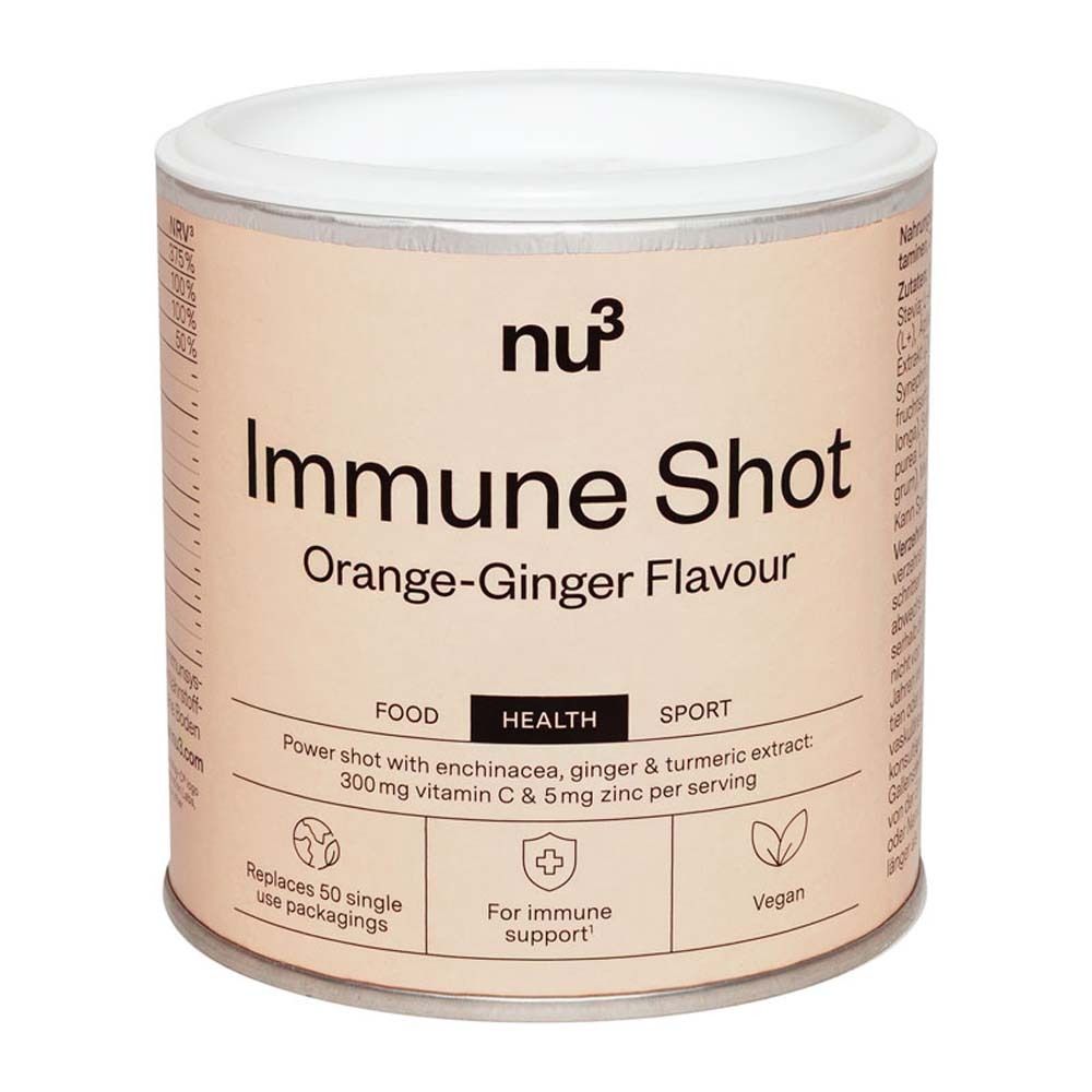 Boîte beige avec couvercle blanc. Inscription : nu3 Immune Shot Orange-Ginger Flavour. Contient vitamine C et zinc.