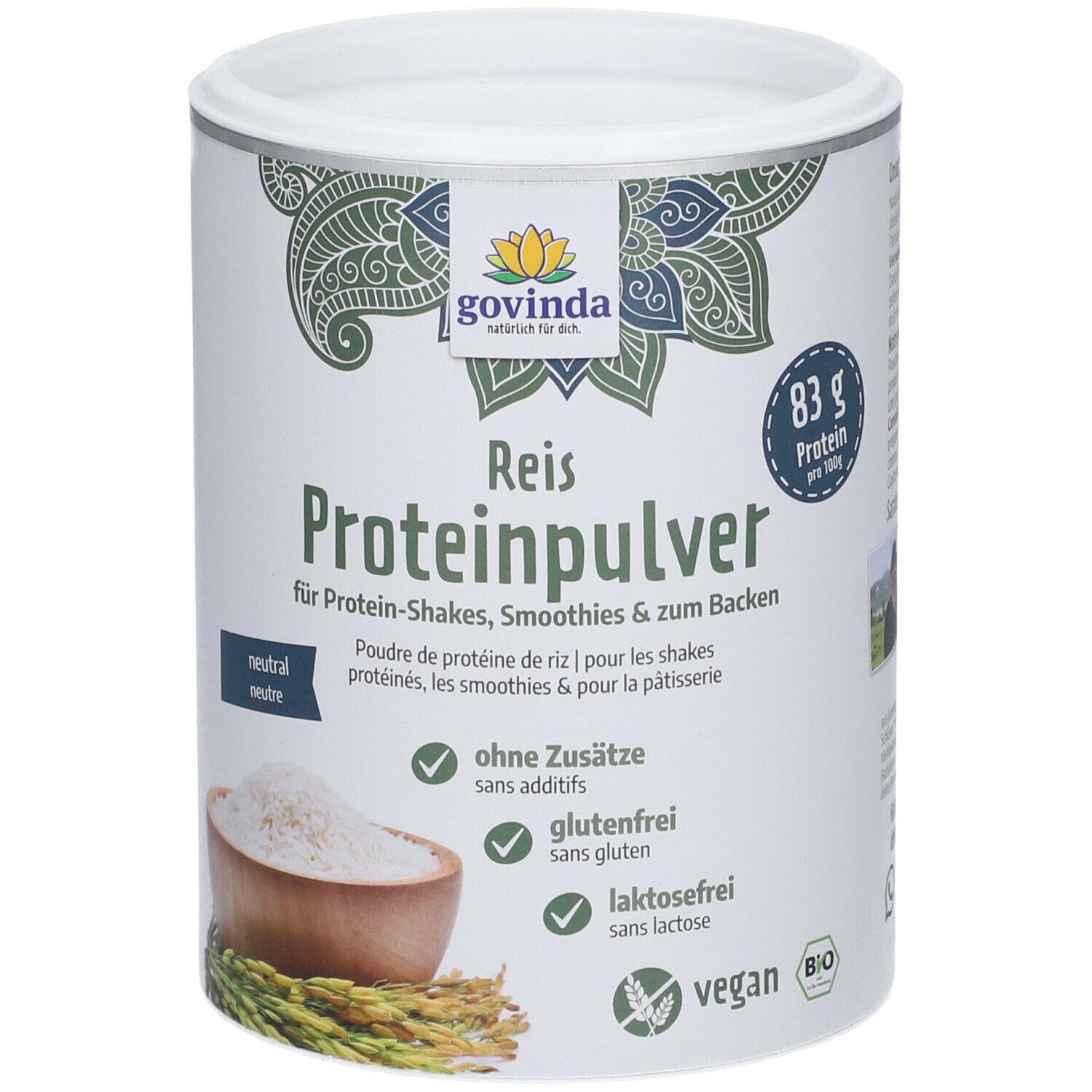 Boîte de poudre de protéine de riz Govinda blanche. Inscription : Reis Proteinpulver, sans additifs, sans gluten, sans lactose, vegan. 83g protéines.
