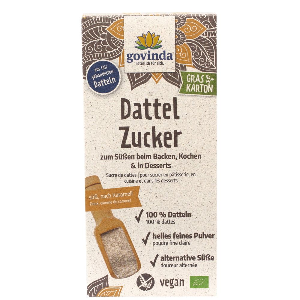 Emballage de Govinda Dattelzucker. Boîte blanche avec nom et logo du produit. Contient du sucre de dattes. Végétalien, certification bio.