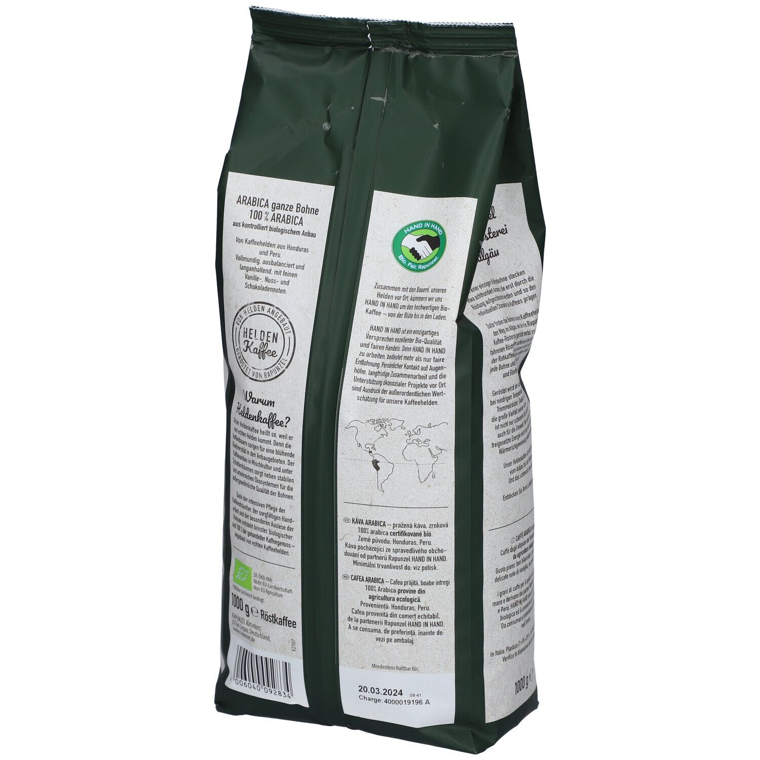 Dos du paquet de grains de café. Texte : Arabica ganze Bohne, 100% Arabica. Label bio. Carte du monde. Date de péremption.