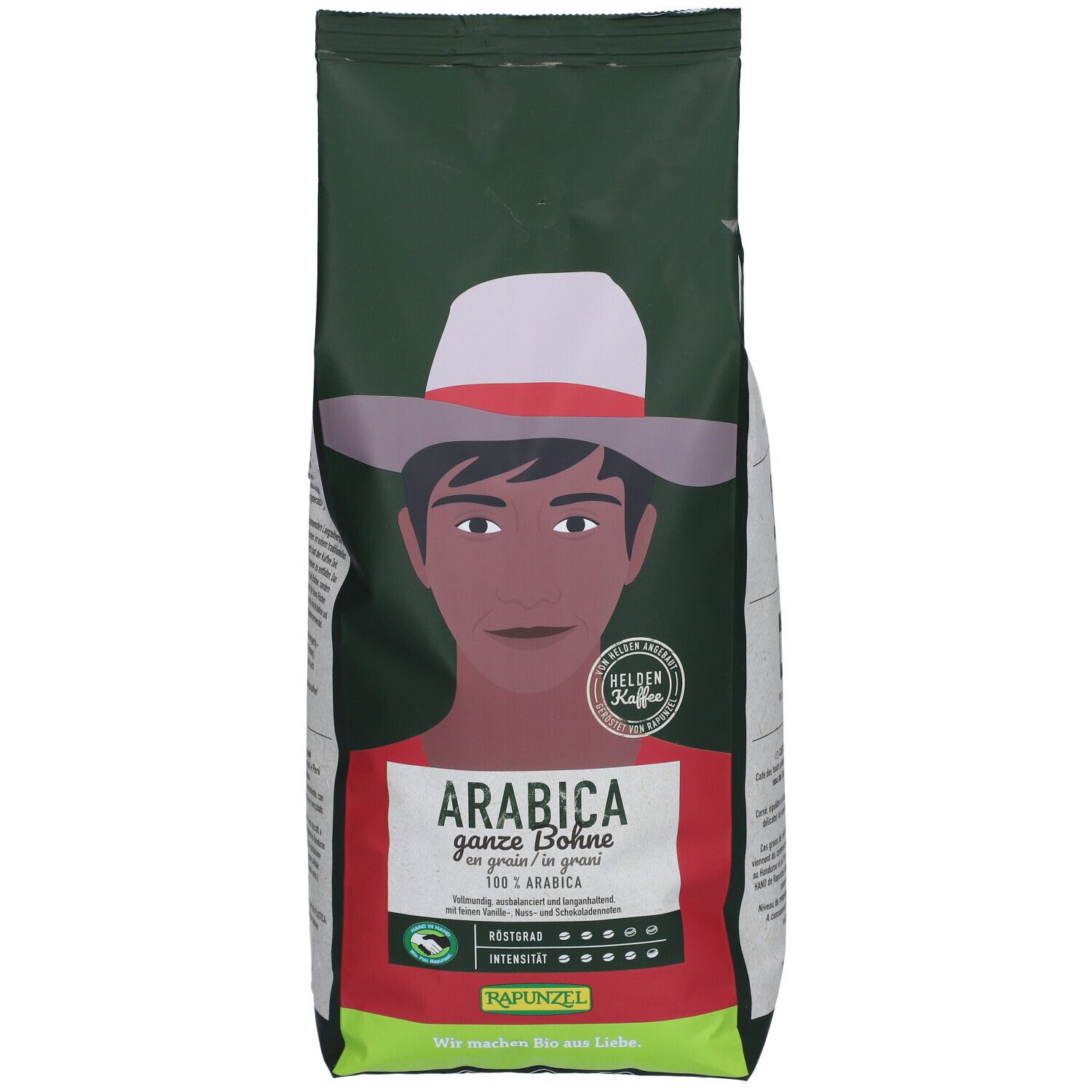 Paquet vert de grains de café Arabica. Illustration d'un homme avec un chapeau. Texte : Arabica ganze Bohne, 100% Arabica. Label bio.