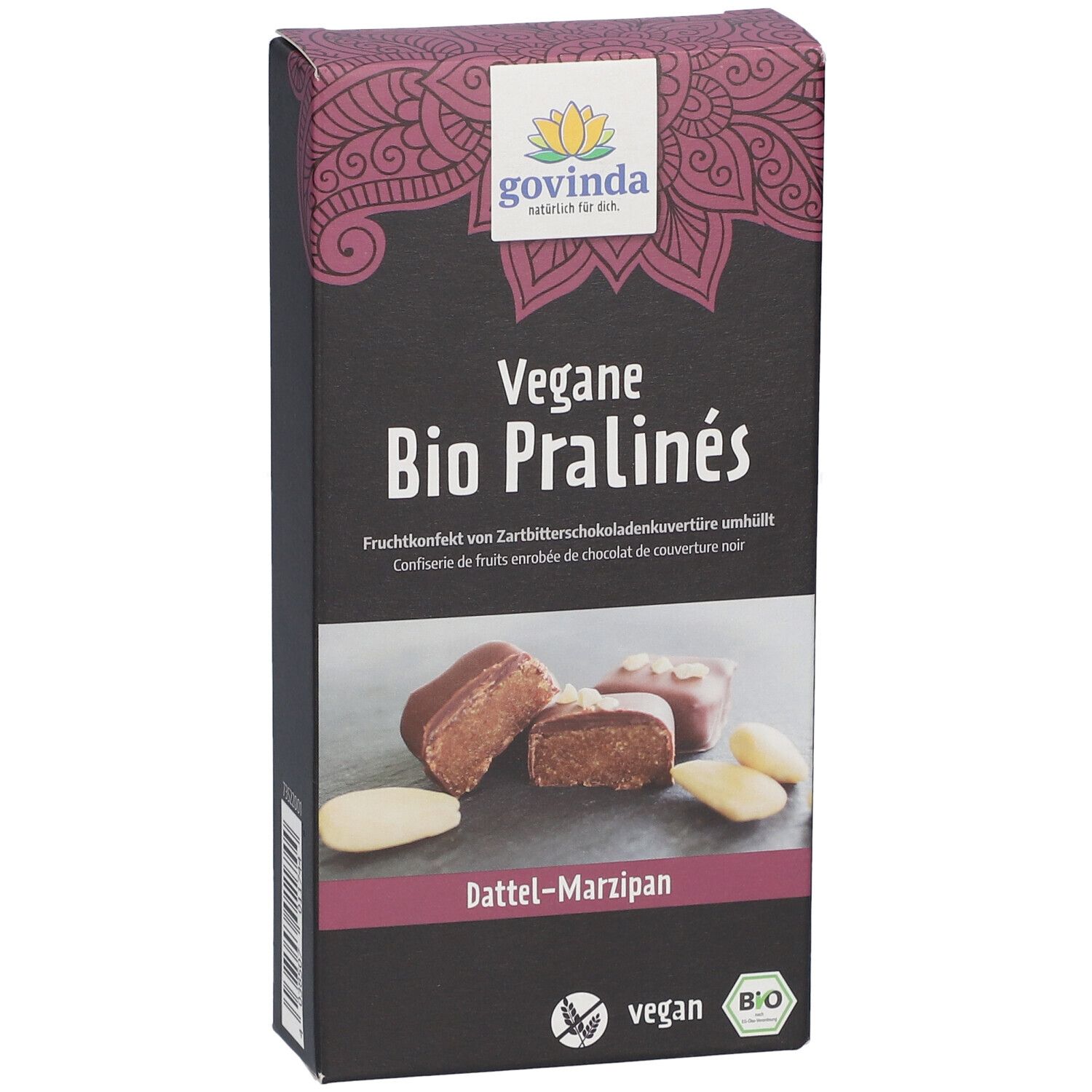Boîte de Pralinés Bio vegan. Inscription: Dattel-Marzipan. Logo bio et vegan. Montre des pralines et des amandes.