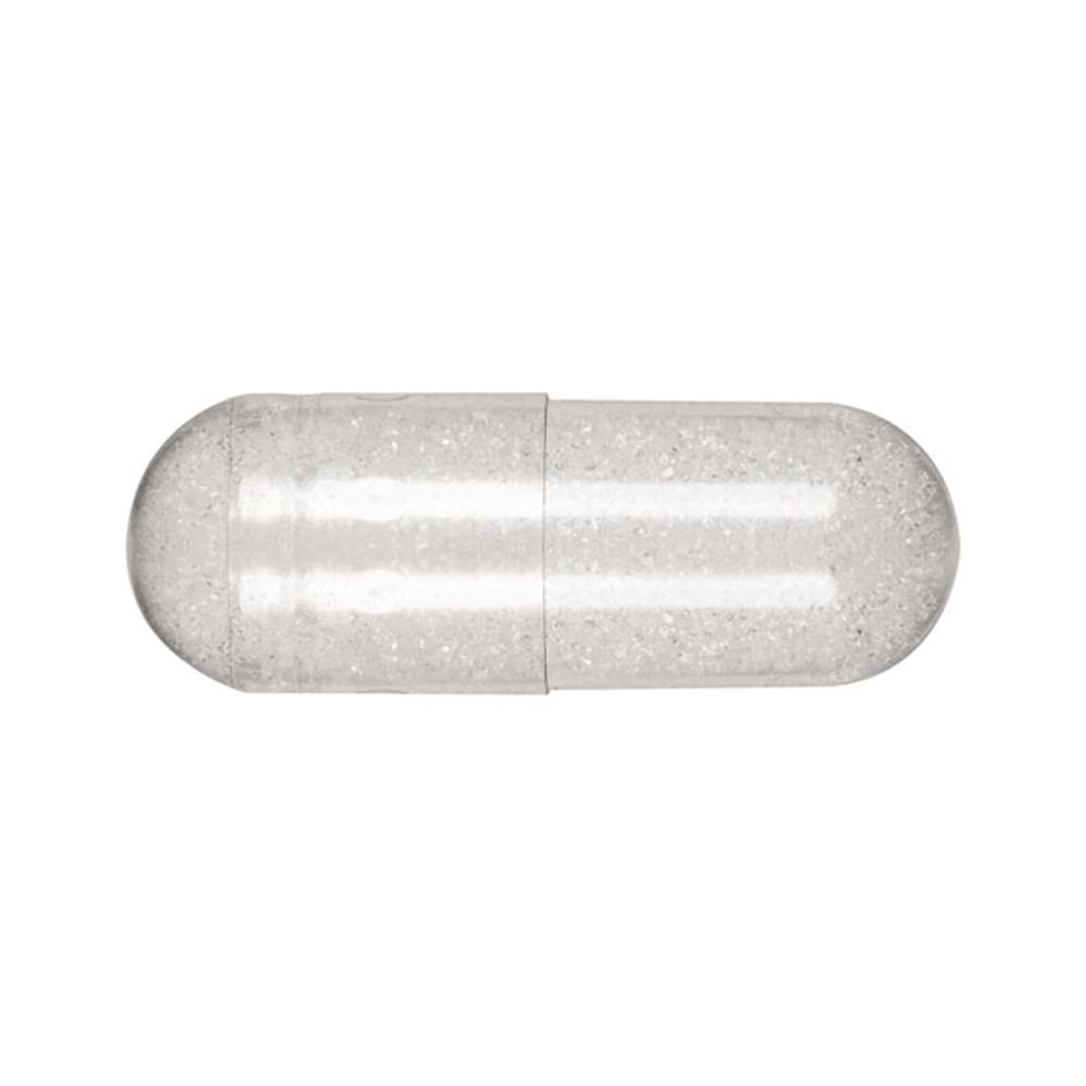 Gélule transparente avec contenu blanc. Vue rapprochée.