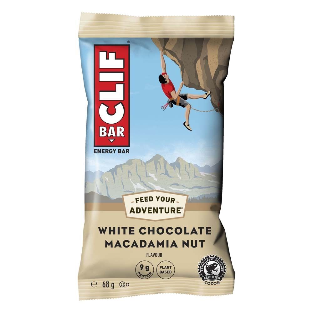 Emballage de barre énergétique CLIF BAR. Saveur White Chocolate Macadamia Nut. Contient 9g de protéines, à base de plantes. Illustration d'un grimpeur.