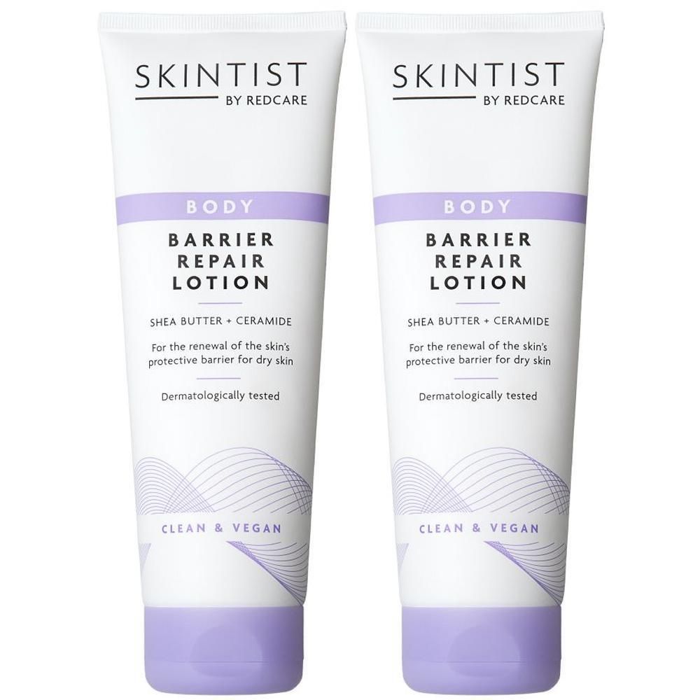 Deux tubes de lotion SKINTIST Body Barrier Repair. Cercle jaune avec "1+1". Tubes blancs avec accents violets et texte.