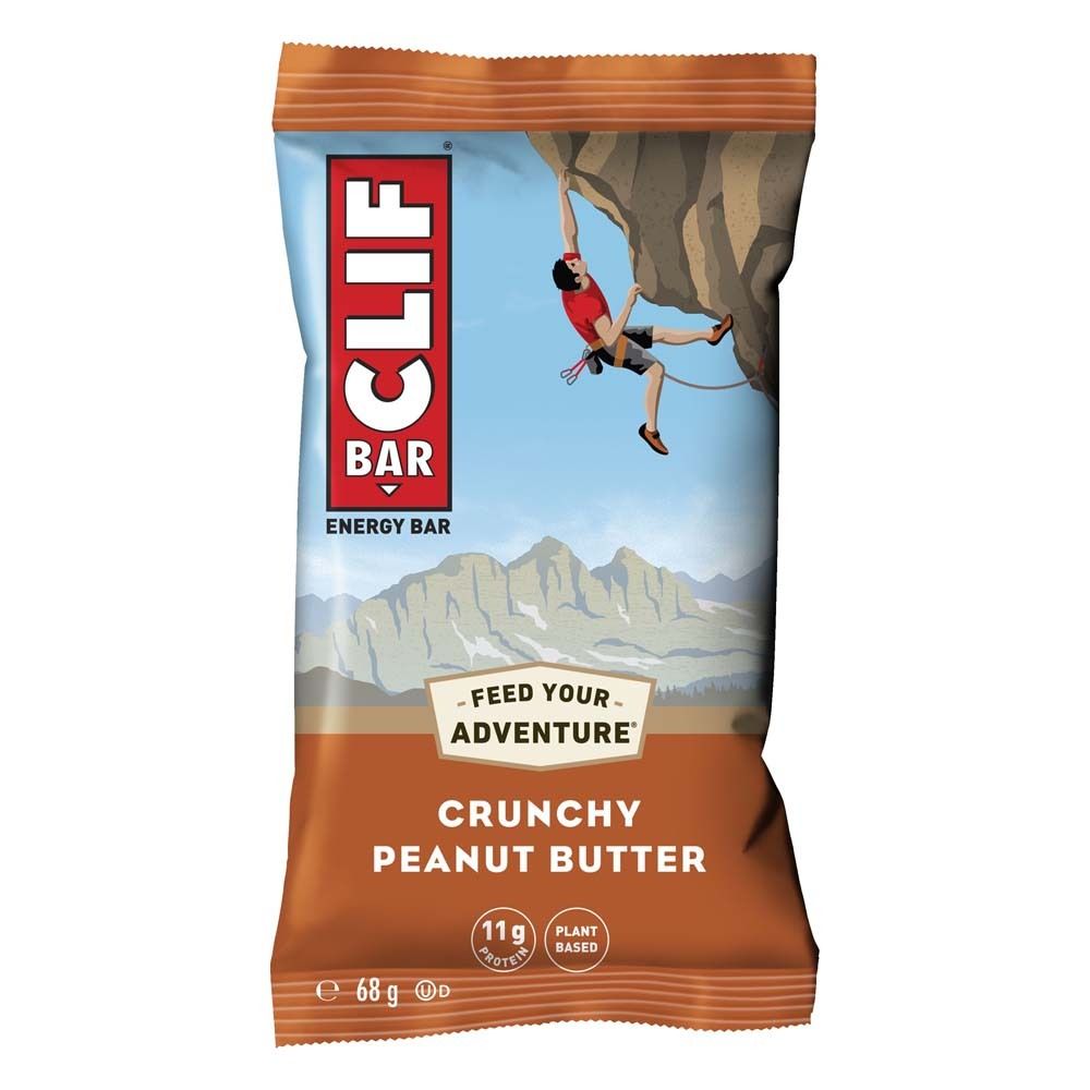 Emballage CLIF Bar Crunchy Peanut Butter. Illustration d'un grimpeur. Contient 11g de protéines, à base de plantes.