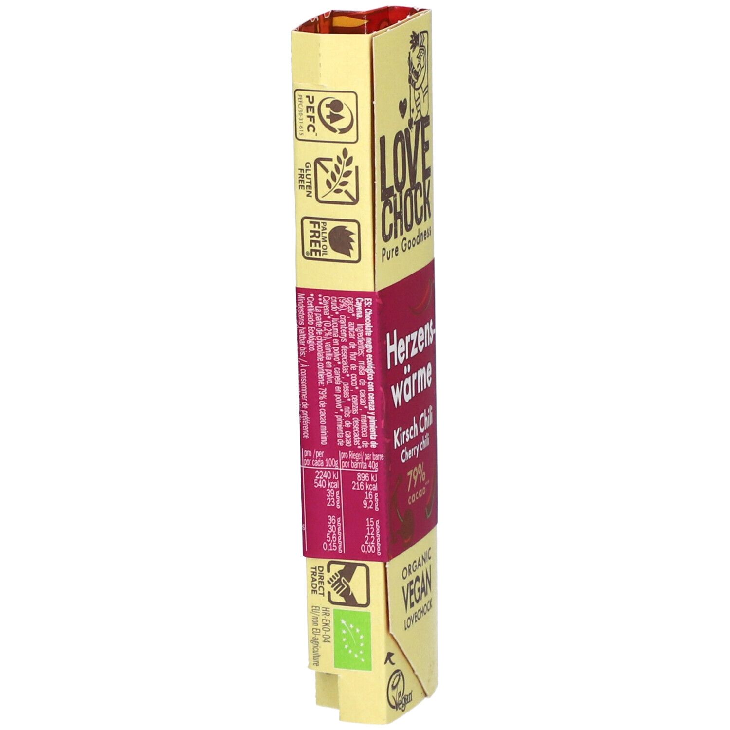 Vue latérale de l'emballage Lovechock Herzenswärme. Jaune-rose, texte et logos. Contient des informations sur les ingrédients.