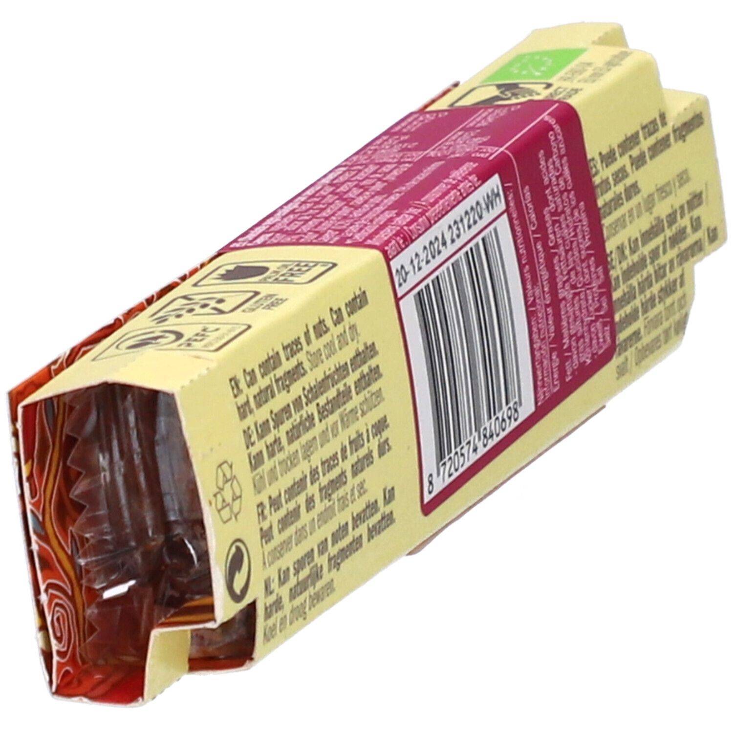 Emballage Lovechock Herzenswärme partiellement ouvert. Vue intérieure avec morceau de chocolat. Code-barres visible.