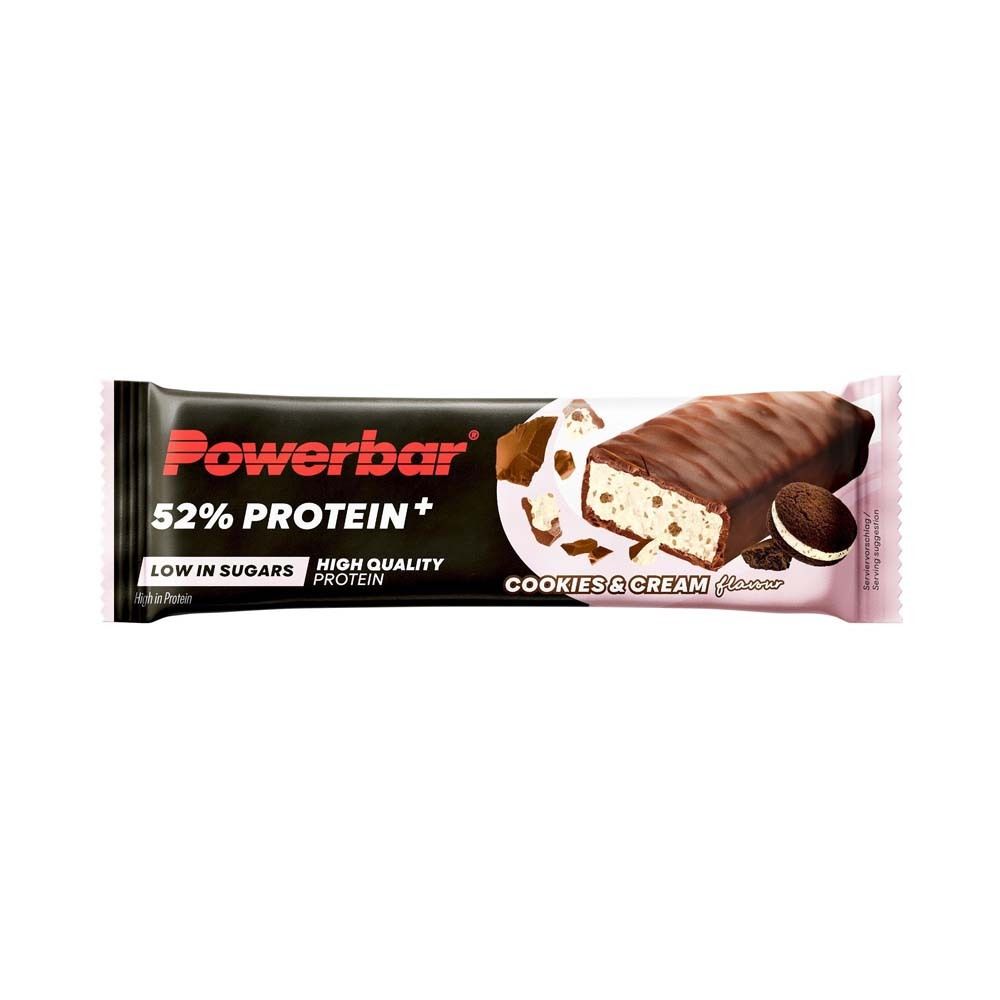 Barre Powerbar 52% Protein Plus, Cookies & Cream. Emballage noir avec image du produit et texte.