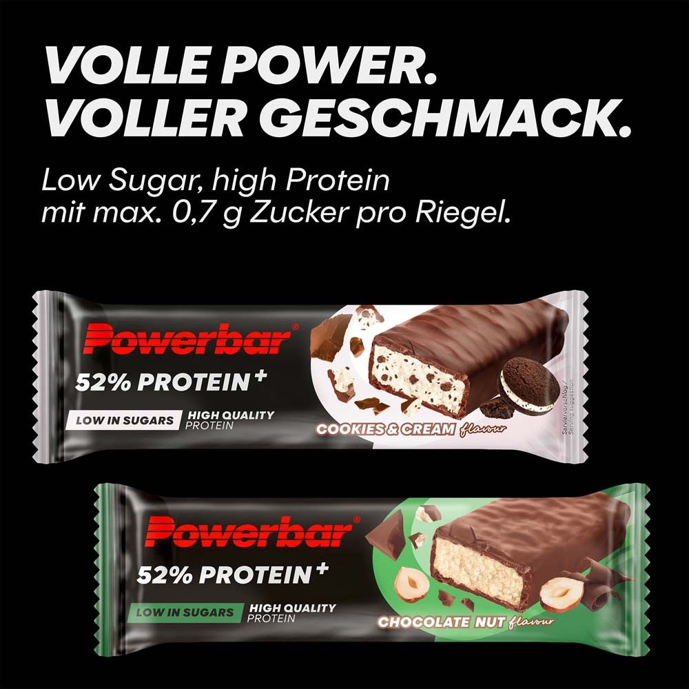 Deux barres Powerbar 52% Protein Plus, Cookies & Cream et Chocolate Nut. Fond noir avec texte.