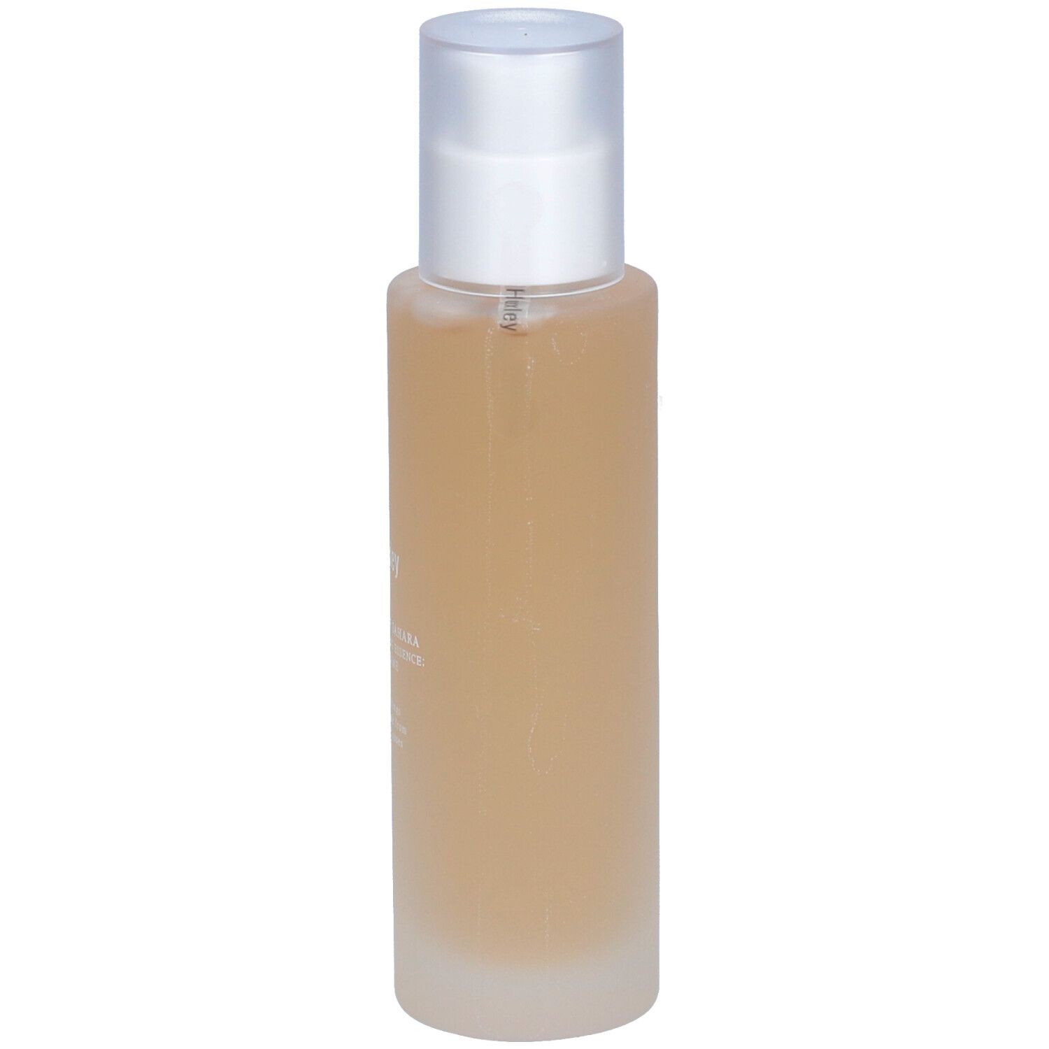 Flacon cylindrique avec contenu transparent et bouchon argenté. Inscription illisible. Flacon debout.