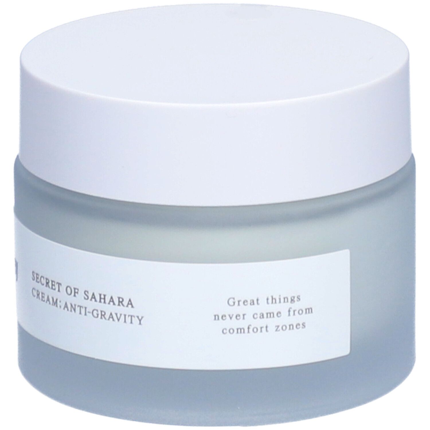 Pot de crème avec couvercle blanc. Étiquette avec 'Secret of Sahara Cream: Anti-Gravity' et slogan.