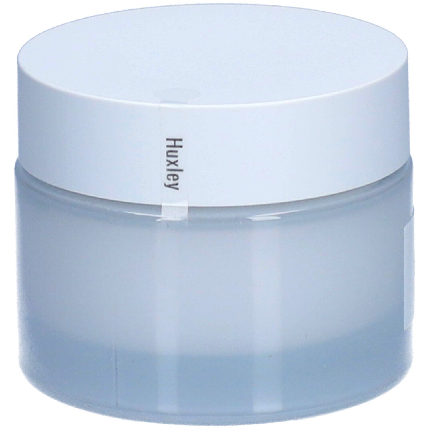 Pot de crème avec couvercle blanc. Étiquette "Huxley".