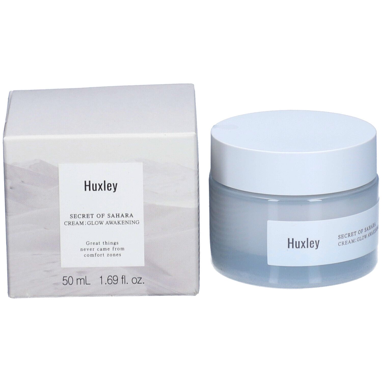 Pot de crème et emballage. Emballage avec "Huxley" et "SECRET OF SAHARA CREAM; GLOW AWAKENING".