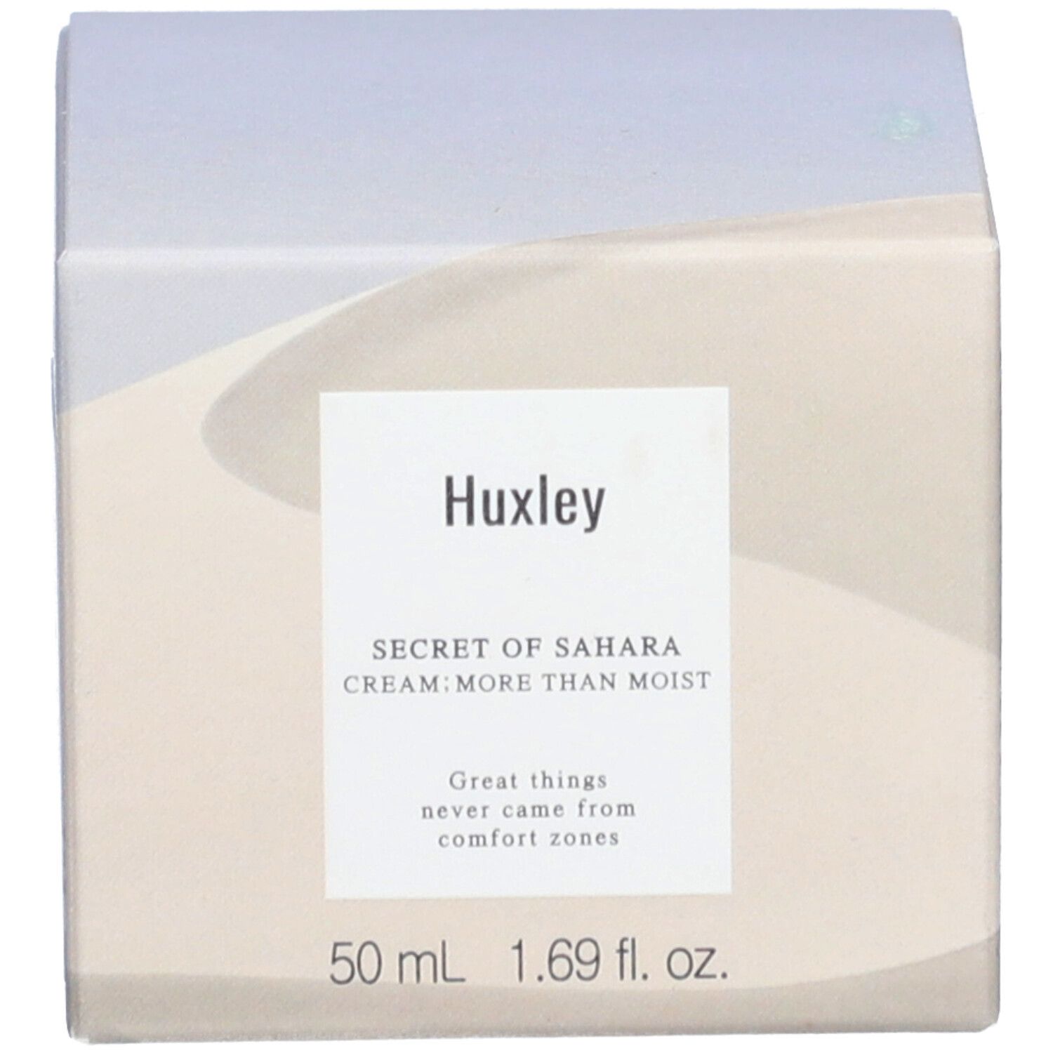 Emballage avec texte : "Huxley SECRET OF SAHARA CREAM; MORE THAN MOIST".