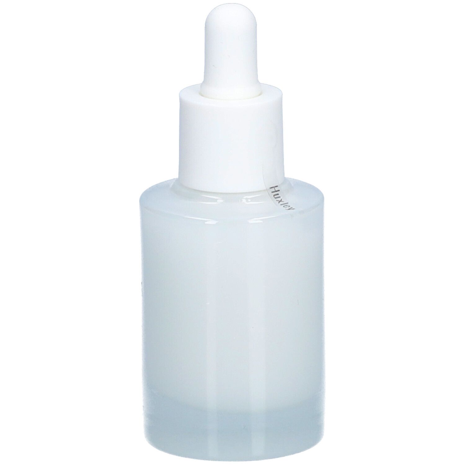 Flacon blanc avec pipette. Étiquette "Huxley" et nom du produit. Gros plan.