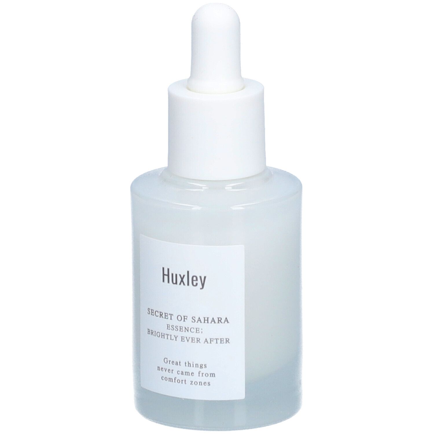 Flacon blanc avec pipette. Étiquette "Huxley" et nom du produit. Gros plan.