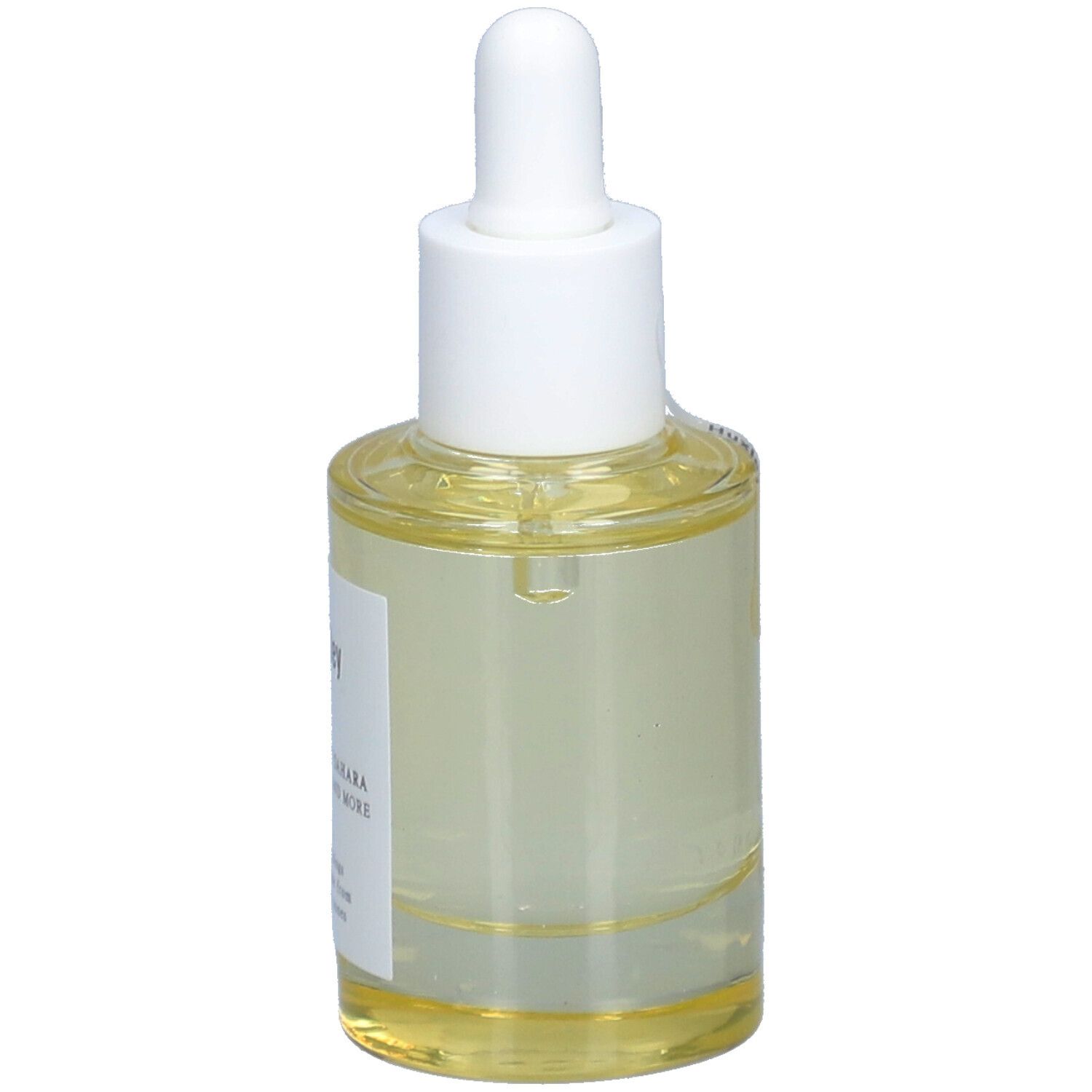 Flacon en verre avec liquide clair, bouchon blanc et pipette. Étiquette avec nom du produit et slogan.