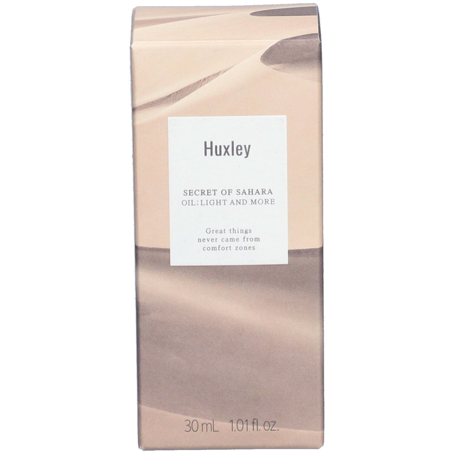 Emballage avec motif désertique. Inscription : Huxley, SECRET OF SAHARA OIL; LIGHT AND MORE, 30 ml, 1.01 fl.oz.